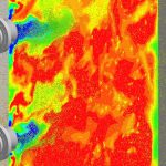Large-eddy simulation on coal combustion furnace by 10,000 parallel computing